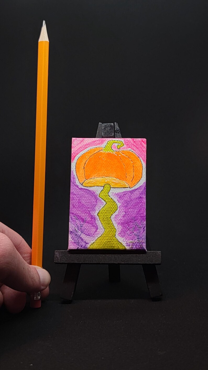 Pumpkin mushroom canvas glowing under blacklight