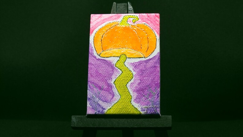 Close view of the pumpkin mushroom painting and iridescent stem